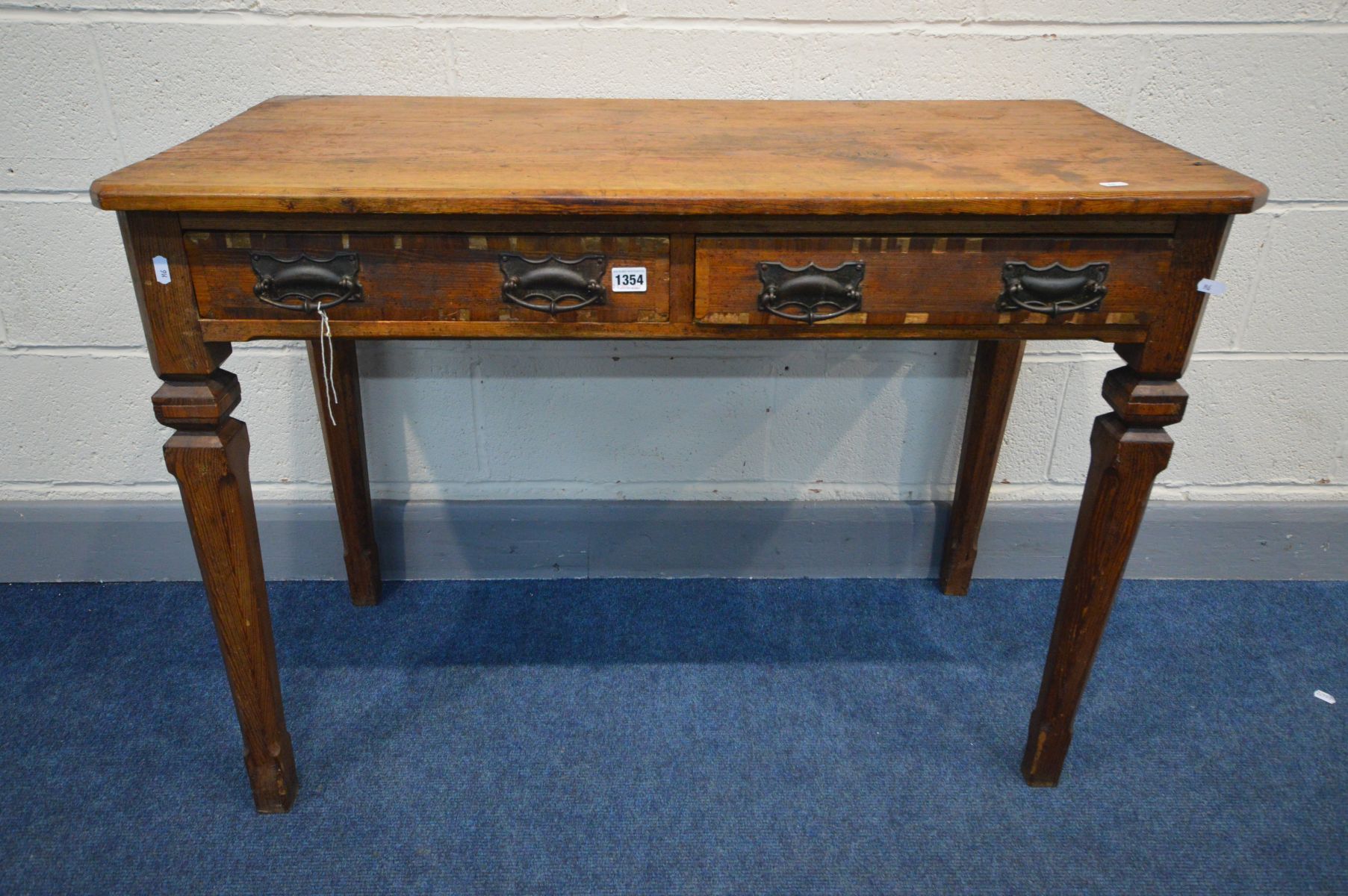 A 19TH CENTURY PITCH PINE SIDE TABLE with two drawers, on square chamfered legs, width 105cm x depth