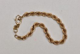 A 9CT GOLD ROPE TWIST BRACELET, hollow rope twist bracelet, fitted with a spring clasp and an