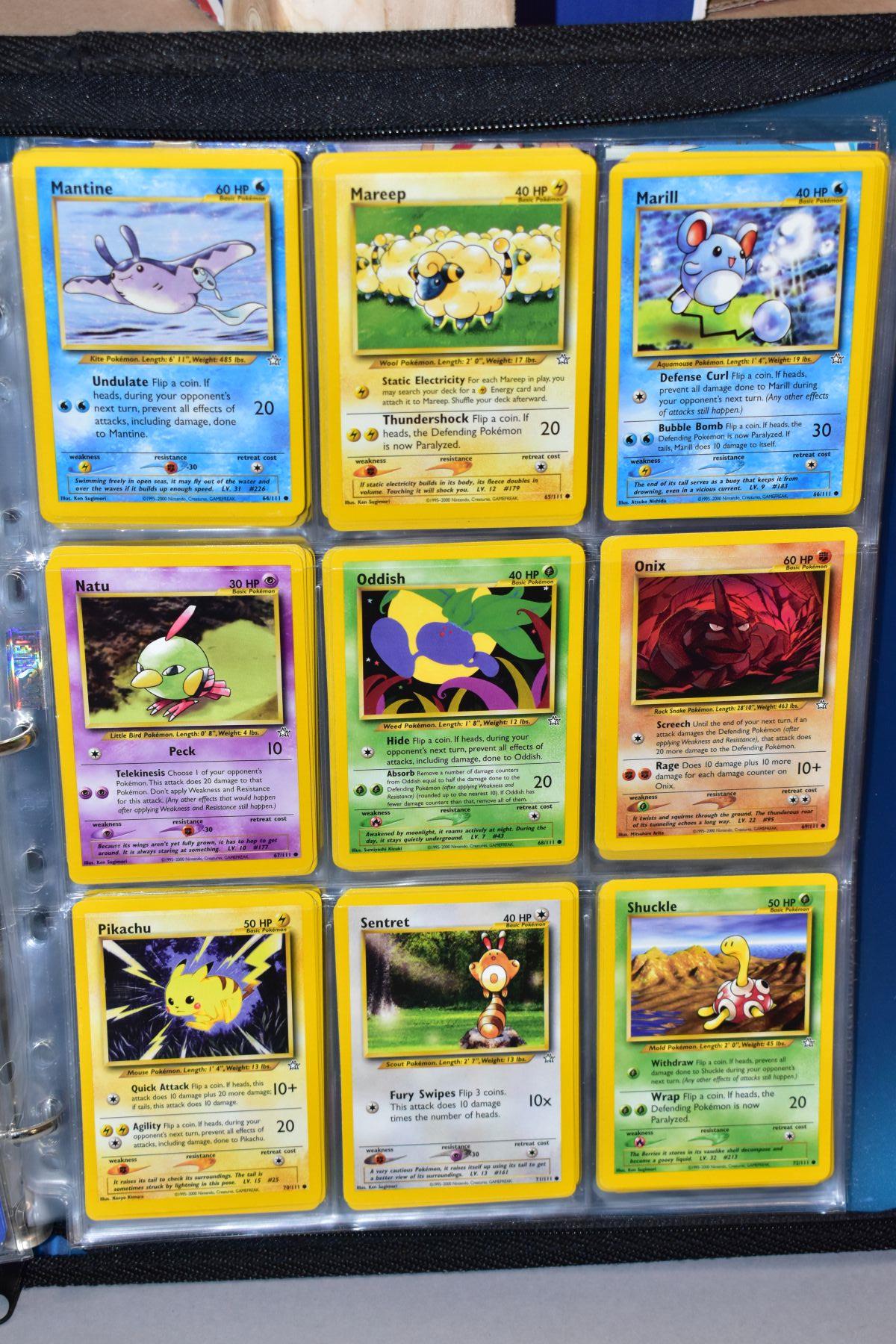 A BLUE POKEMON FOLDER CONTAINING AN ALMOST COMPLETE NEO GENESIS SET, which includes first - Bild 20 aus 33