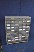 AN INDUSTRIAL WORKSHOP BANK OF FORTY TWO DRAWERS, a metal carcass with plastic drawers, width 90cm