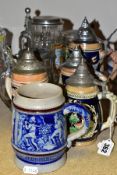 NINE STEINS, FIVE CERAMIC AND FOUR GLASS, eight with lids (large chip and extensive crack to one