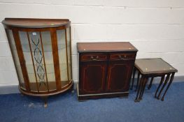 A WALNUT DEMI LUNE CHINA CABINET, along with a mahogany side cabinet and a nest of three tables (3)