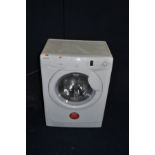 A HOOVER OPHS 712 DF WASHING MACHINE (PAT pass and working but not tested any further)