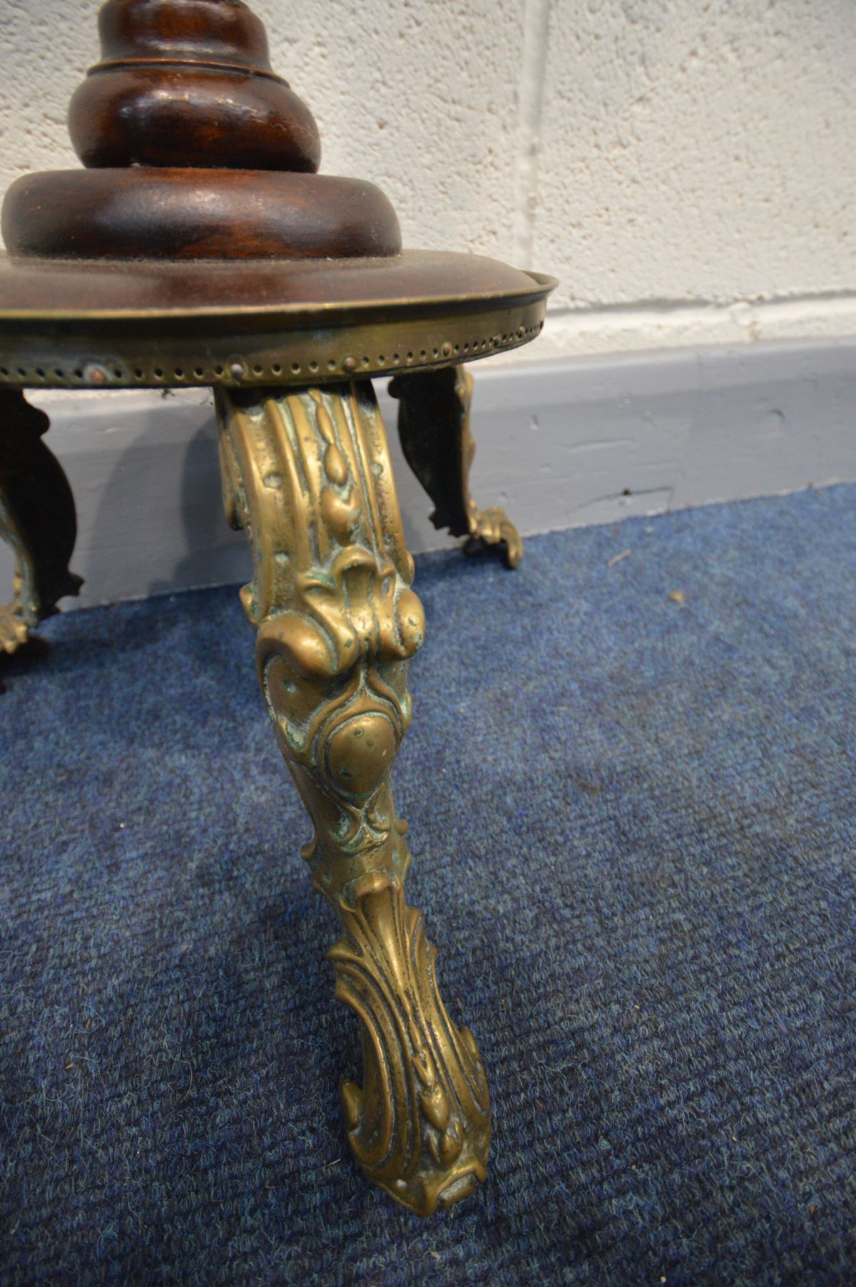 A MAHOGANY TORCHERE STAND, with a brass pierced gallery above a circular top, on turned and fluted - Image 2 of 3