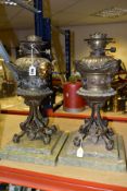 A PAIR OF LATE 19TH CENTURY OIL LAMPS OF SECTIONAL FORM, no shades or chimneys, removable facet