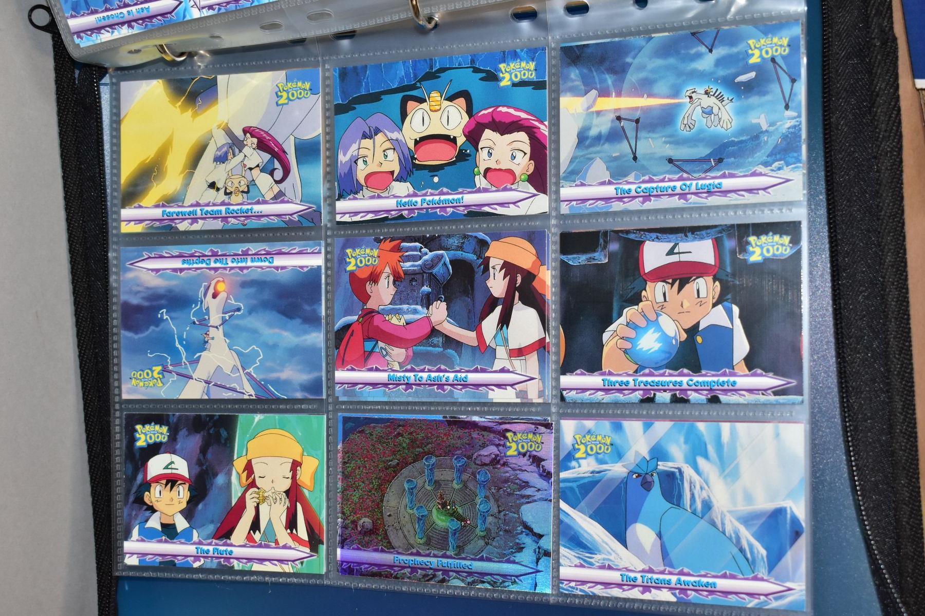 A BLUE POKEMON FOLDER CONTAINING AN ALMOST COMPLETE NEO GENESIS SET, which includes first - Bild 32 aus 33