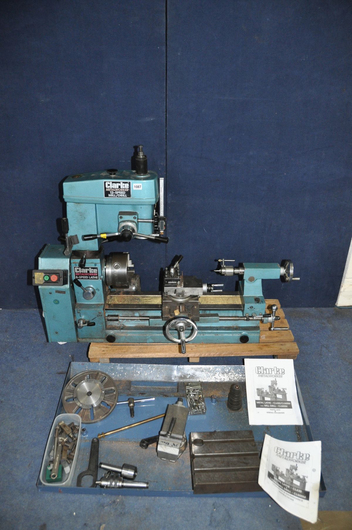 A CLARKE CL500M METALWORKER LATHE/MILL/DRILL, including three jaw chuck, feed gears, face plate,