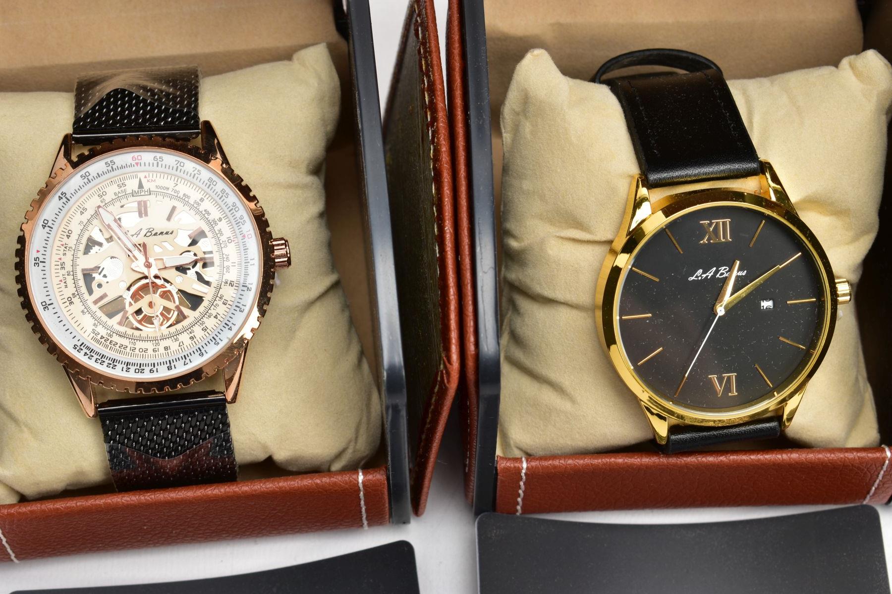 FOUR BOXED 'L. A. BANUS' WRISTWATCHES, two matching with round black dials Roman twelve and six - Image 3 of 4