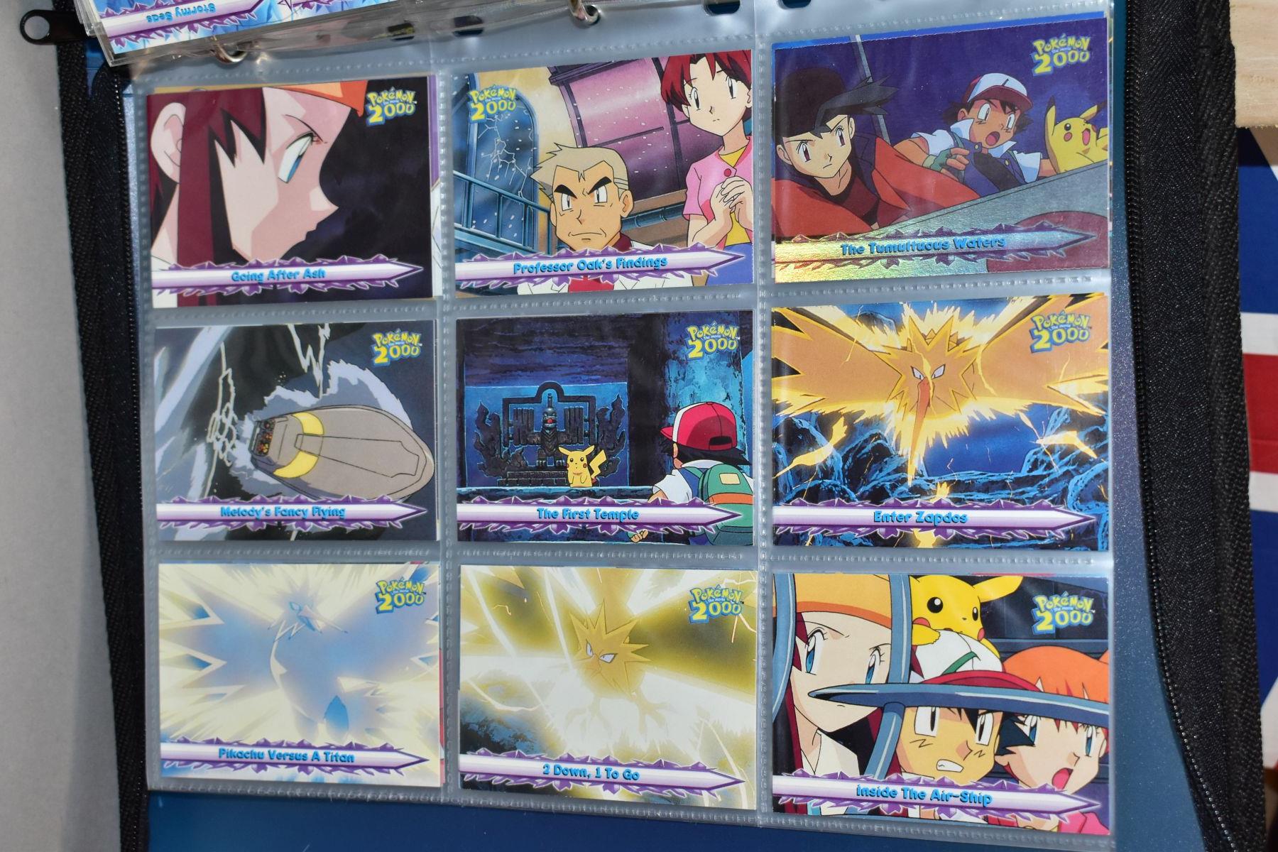 A BLUE POKEMON FOLDER CONTAINING AN ALMOST COMPLETE NEO GENESIS SET, which includes first - Bild 29 aus 33