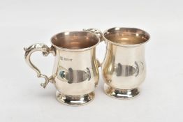 A PAIR OF SILVER TANKARDS, plain polished baluster form, scroll detailed handle with a leaf shaped