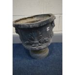 A PERIOD LEAD URN, masks and fleur de Lis to the perimeter, diameter 37cm x height 43cm (