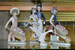 FOUR BOXED LLADRO FIGURINES, comprising 1265 'Duck Jumping', designed by Julio Fernandez, issued