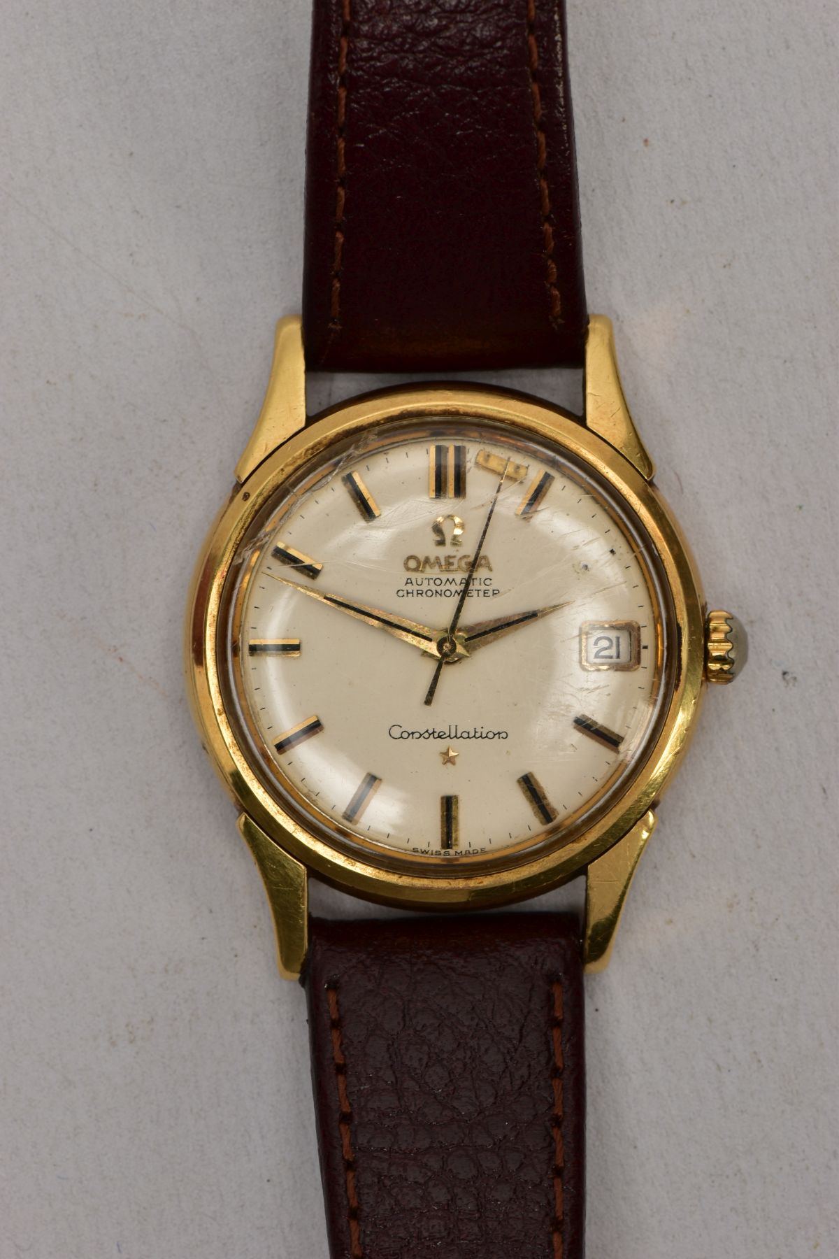 A GENTS 18CT GOLD OMEGA CONSTELLATION WRISTWATCH, automatic movement, round champagne dial signed '