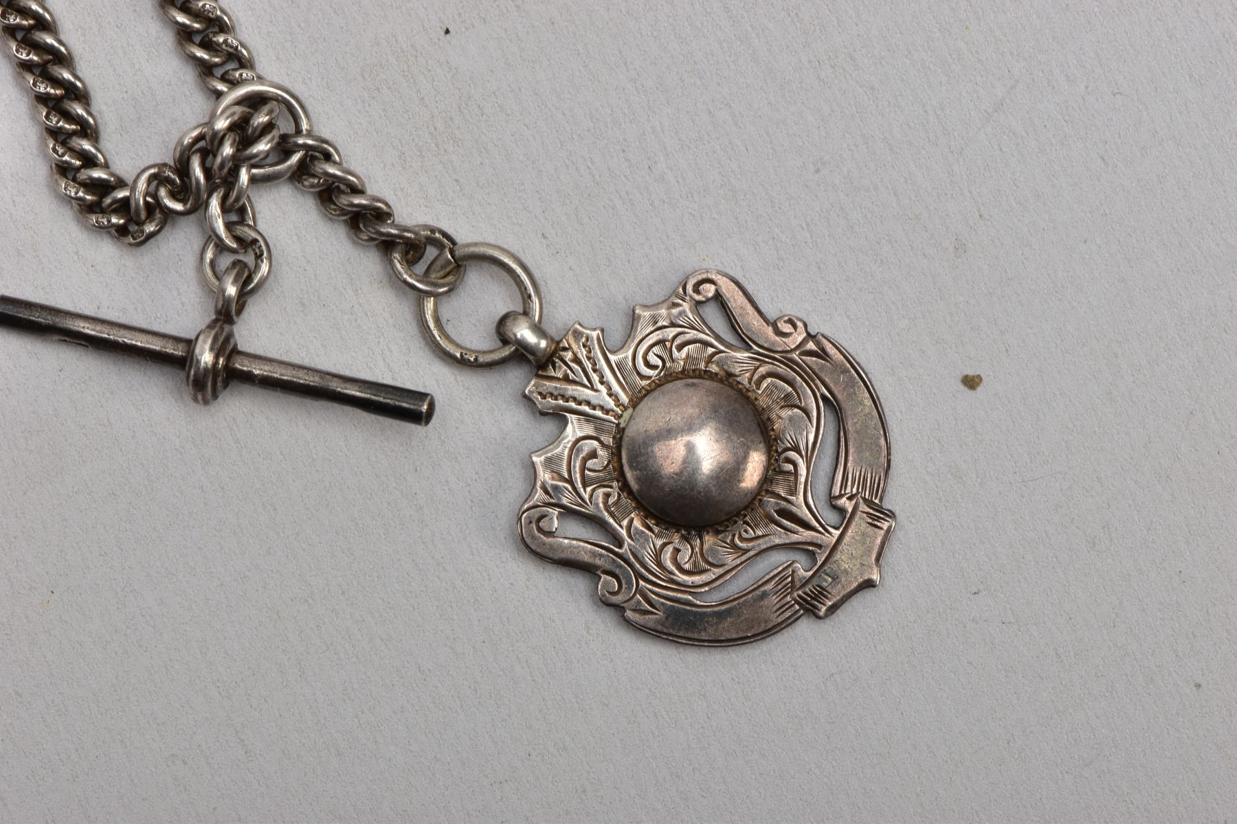A SILVER OPEN FACE POCKET WATCH WITH AN ALBERT CHAIN AND A FOB MEDAL, round engine turned design - Image 3 of 7