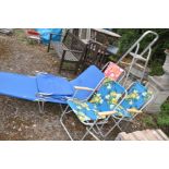 THREE 1970S METAL FOLDING CHAIRS with floral fabric coverings, a lounger, a metal washboard and a