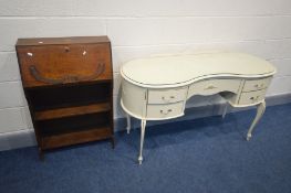 A CREAM AND GILT KIDNEY DRESSING TABLE (no mirrors) and an oak bureau (2)