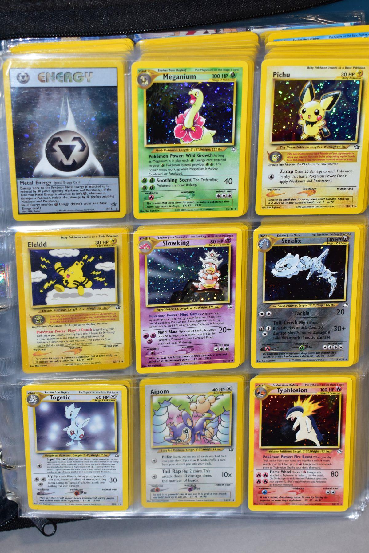 A BLUE POKEMON FOLDER CONTAINING AN ALMOST COMPLETE NEO GENESIS SET, which includes first - Bild 3 aus 33