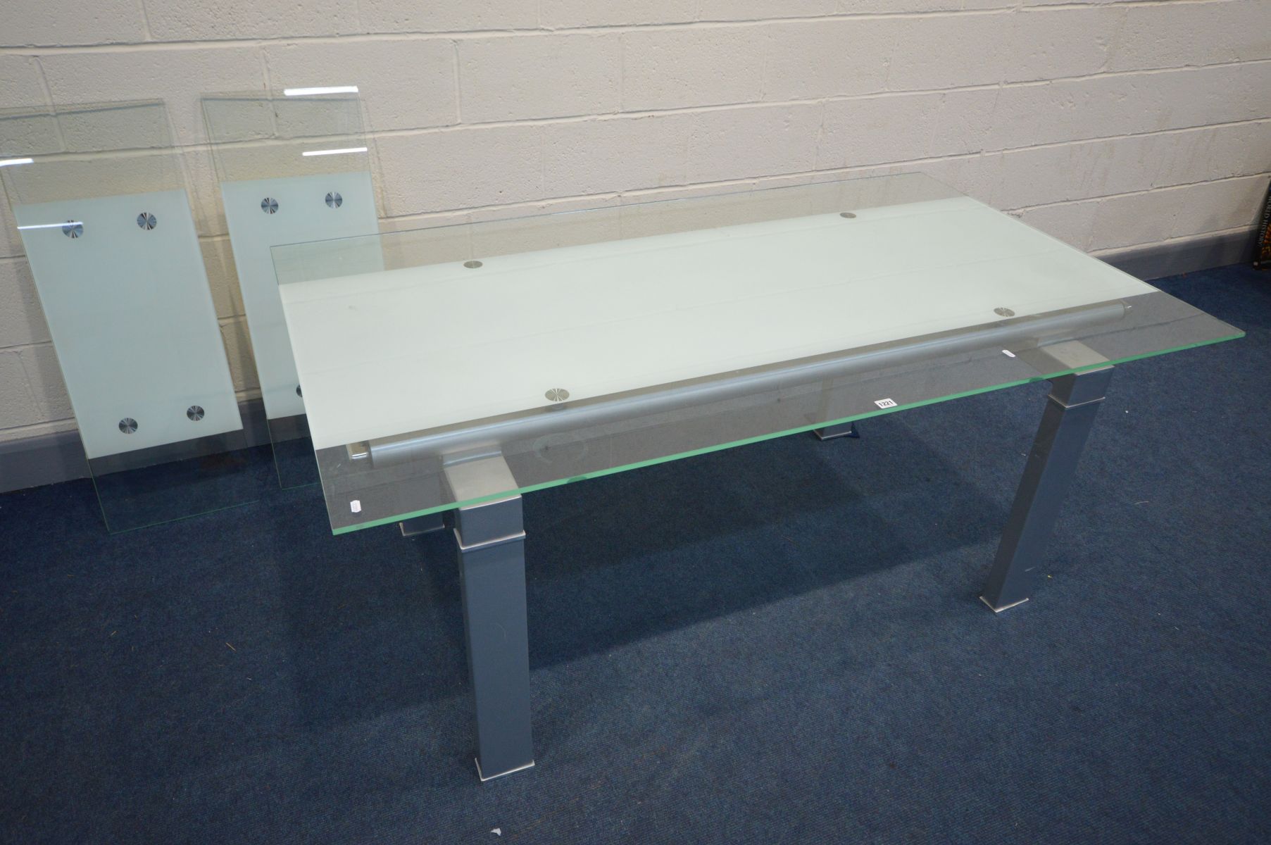 A MODERN GLASS TOP EXTENDING CONFERENCE/DINING ROOM TABLE, on a metal block frame, pull out leaf - Image 2 of 6