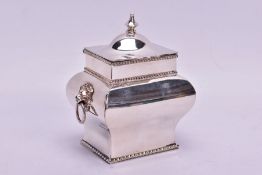 A SECOND HALF 20TH CENTURY SILVER PLATE ON COPPER TEA CADDY OF BOMBE FORM, knopped finial, gadrooned