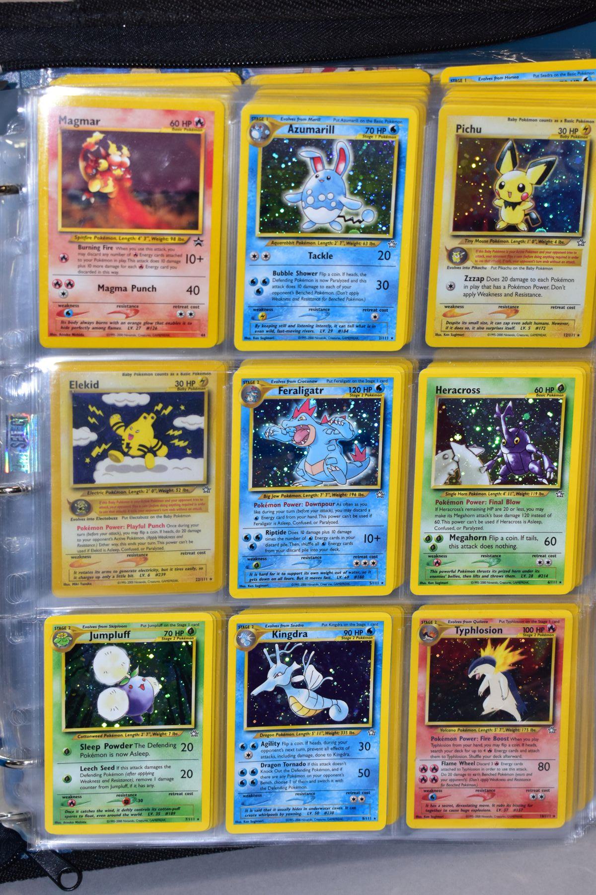 A BLUE POKEMON FOLDER CONTAINING AN ALMOST COMPLETE NEO GENESIS SET, which includes first - Bild 2 aus 33