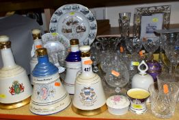 A MIXED GROUP OF CERAMICS AND GLASS, to include five ceramic Bells Whisky decanters (still