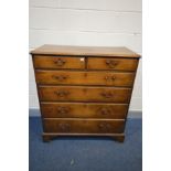 A GEORGIAN OAK CHEST OF TWO SHORT OVER FOUR GRADUATED DRAWERS, drop handles, on bracket feet,