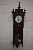 A MAHOGANY REGULATOR VIENNA WALL CLOCK, with a 7 inch dial, roman numerals and seconds dial,