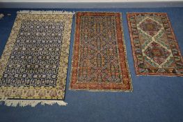 TWO PERIOD WOOLLEN RUGS, one Kashan rug, at 177cm x 104cm and a Kazan, 145cm x 87cm along with a