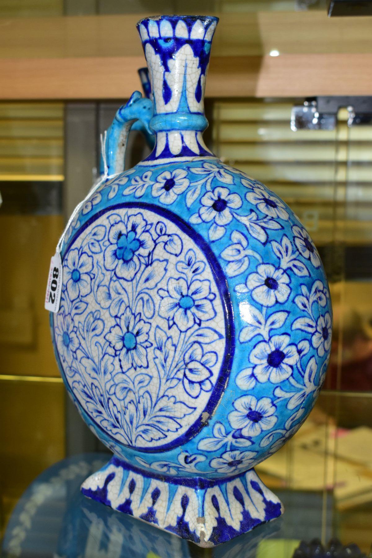A PAIR OF LATE 19TH/EARLY 20TH CENTURY IZNIK STYLE EWERS, of moon flask form, the turquoise and blue - Image 2 of 8