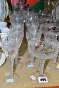 STUART CRYSTAL GLASSWARE AND CUT GLASS DECANTER, comprising three sets of crystal glasses with grape