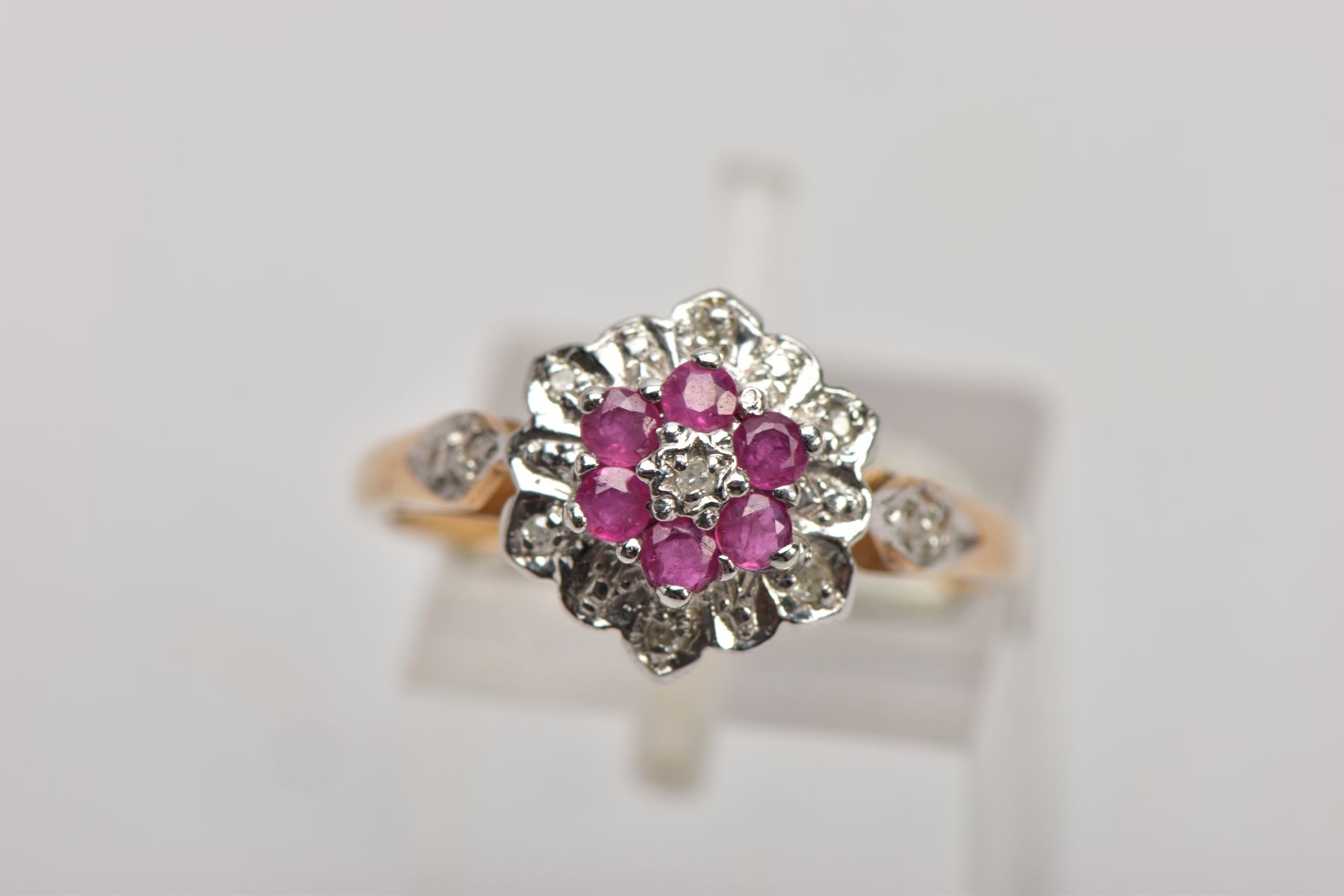 A 9CT GOLD RUBY AND DIAMOND CLUSTER RING, the three tier cluster set with a central single cut - Image 4 of 4