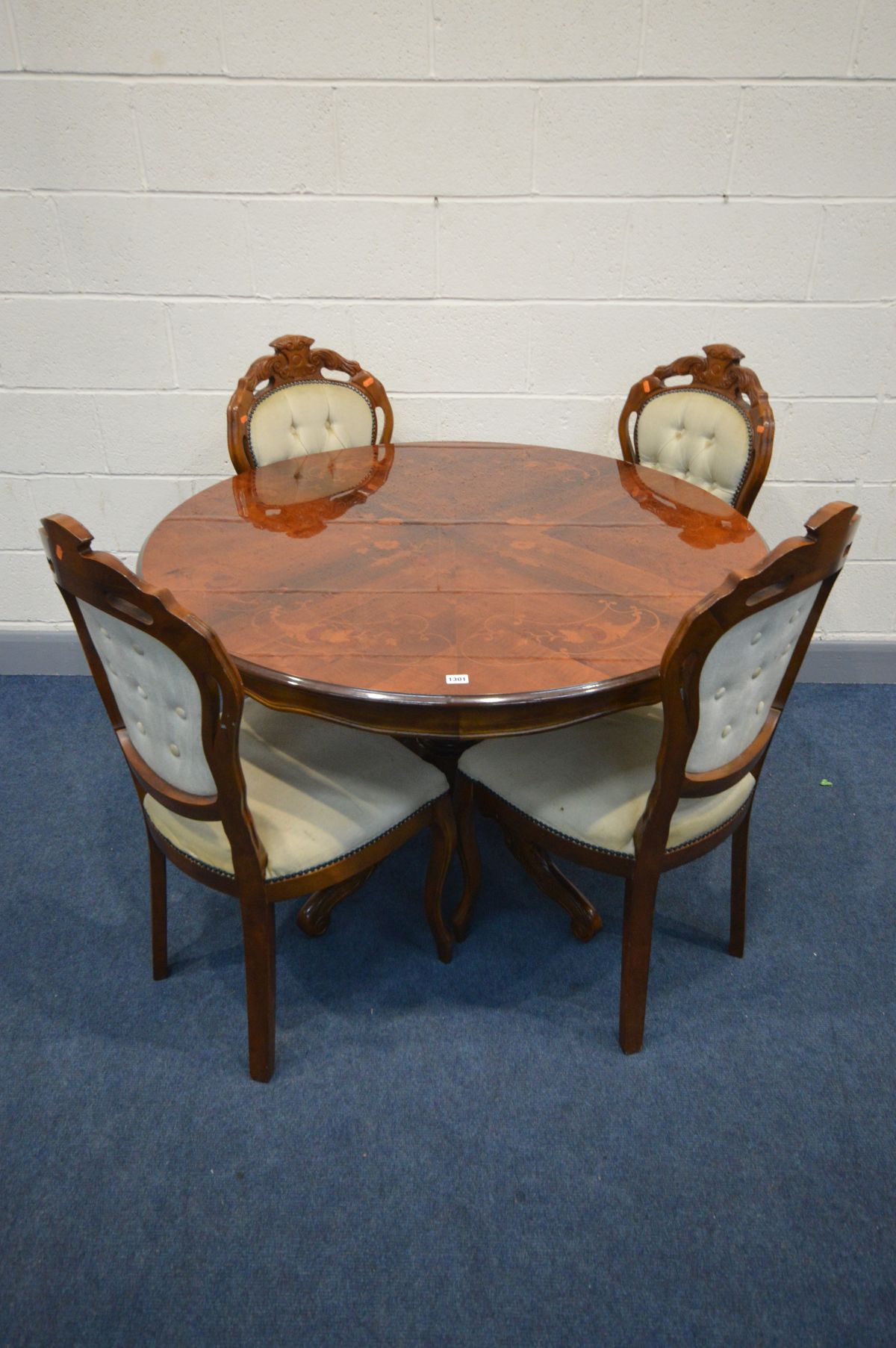 AN ITALIAN CIRCULAR DINING TABLE, diameter 119cm x height 78cm, and four chairs (all chairs rickety)