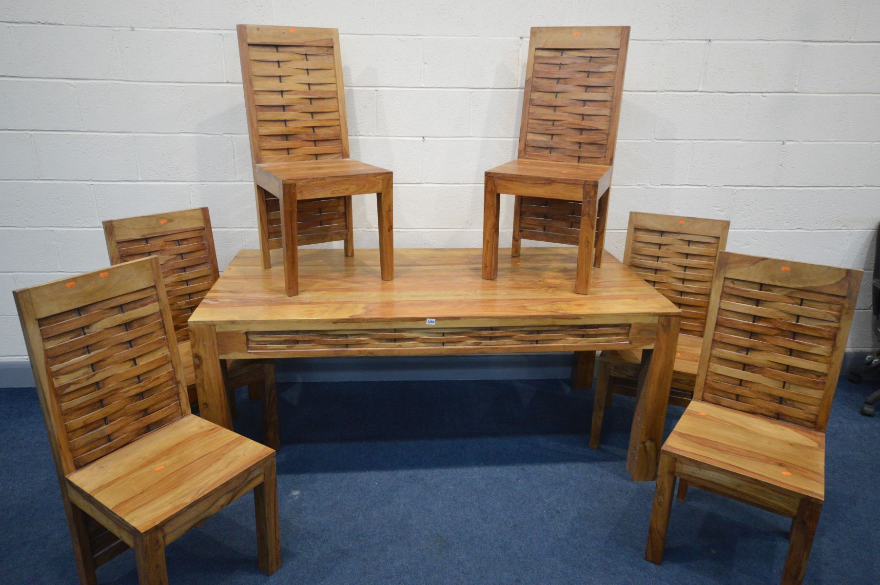 A MANGO WOOD DINING TABLE with weaving to each frieze, on block legs and a set of six matching - Image 3 of 3