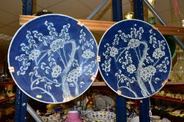 A NEAR PAIR OF LATE 19TH CENTURY CHINESE PRUNUS BLOSSOM BLUE AND PORCELAIN CHARGERS, decorated