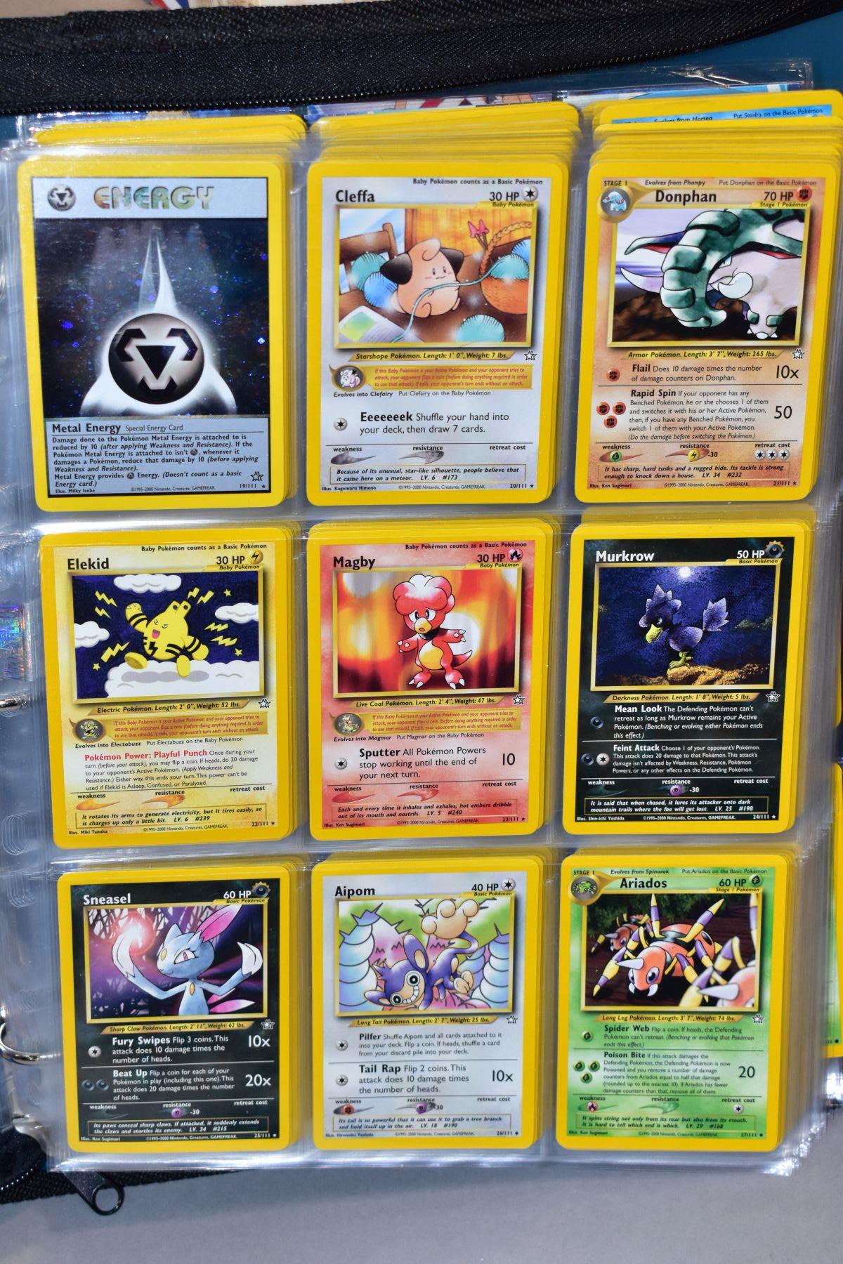 A BLUE POKEMON FOLDER CONTAINING AN ALMOST COMPLETE NEO GENESIS SET, which includes first - Bild 4 aus 33