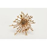 A 1970'S 9CT GOLD BROOCH, an abstract spray design with central beaded detail and vary length