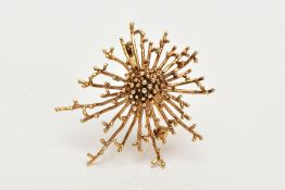 A 1970'S 9CT GOLD BROOCH, an abstract spray design with central beaded detail and vary length