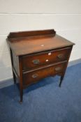 AN OAK CHEST OF TWO DRAWERS