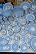 FORTY FOUR PIECES OF PALE BLUE WEDGWOOD JASPERWARE, to include teapot, two footed bowls (diameters
