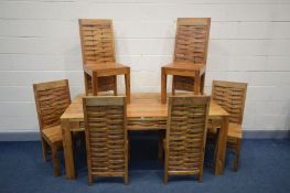 A MANGO WOOD DINING TABLE with weaving to each frieze, on block legs and a set of six matching