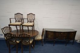 A STRONGBOW MAHOGANY EXTENDING TABLE, one additional leaf, six chairs including two carvers and a