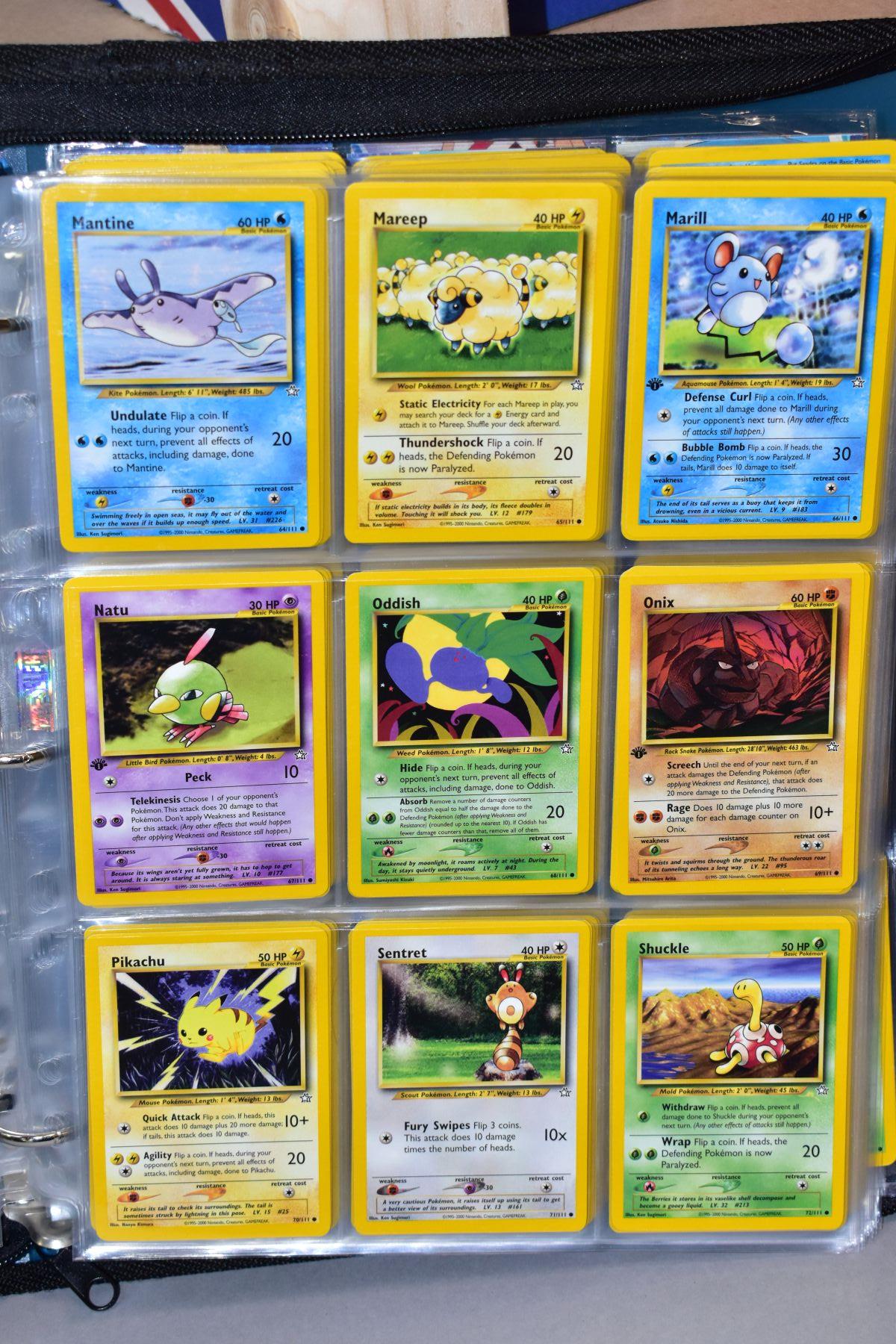 A BLUE POKEMON FOLDER CONTAINING AN ALMOST COMPLETE NEO GENESIS SET, which includes first - Bild 9 aus 33