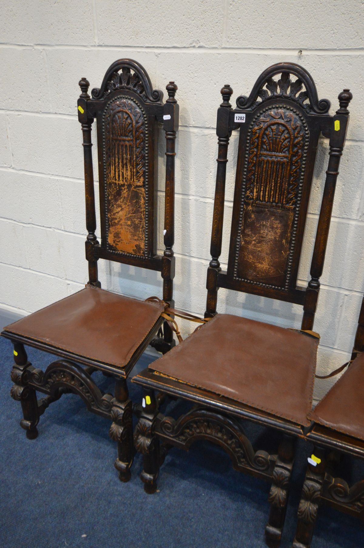 A SET OF FOUR CARVED OAK BAROQUE STYLE CHAIRS with embossed leather back and bergère seat, with - Image 2 of 3