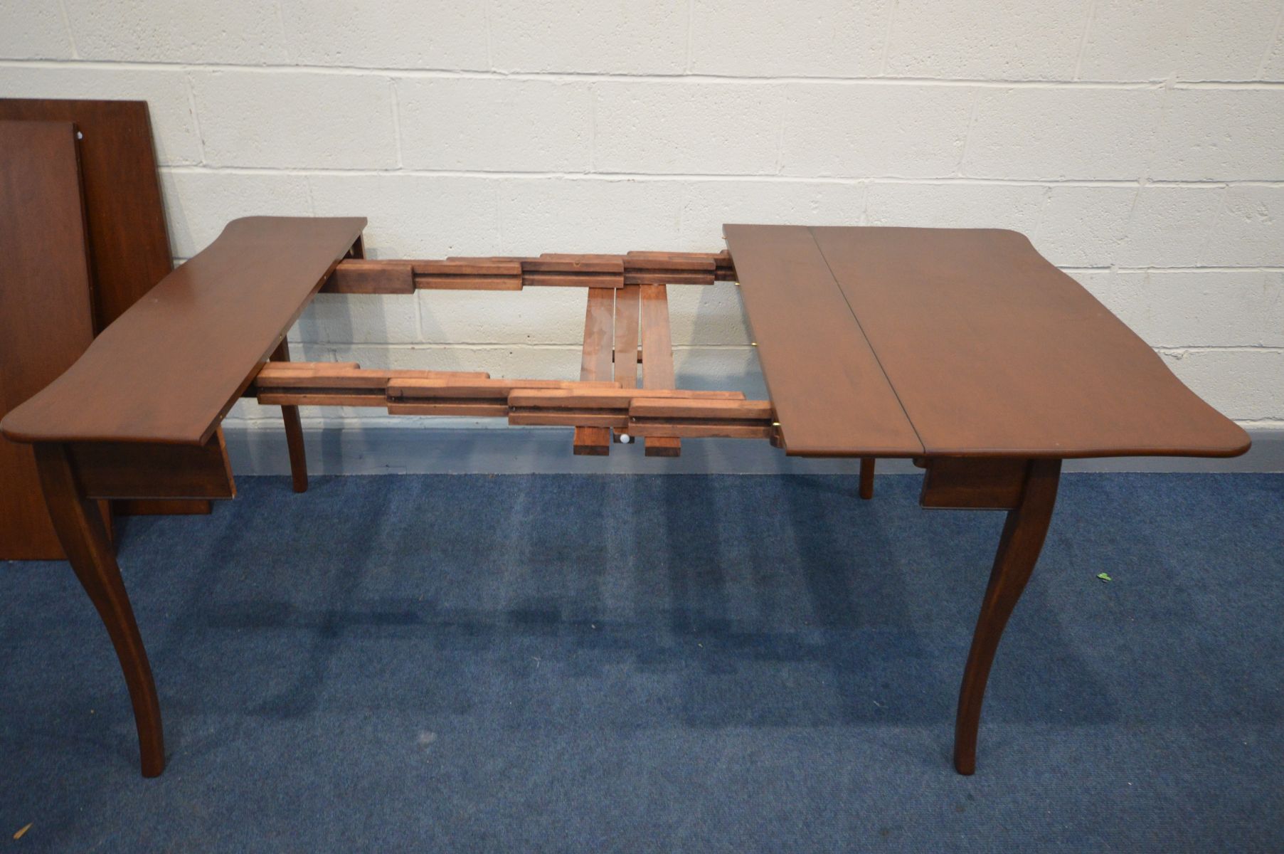 AN CHERRYWOOD EXTENDING DINING TABLE, that folds out from a tea table, with two additional leaves, - Image 2 of 4