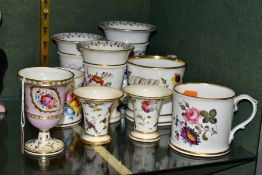 NINE PIECES OF MID 19TH CENTURY BRITISH PORCELAIN HAND PAINTED WITH FLOWERS, comprising a mug,