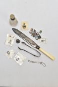 A SELECTION OF SILVER AND WHITE METAL ITEMS, to include a pair of late Victorian silver sugar tongs,