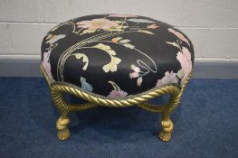 A 20TH CENTURY GILT ROBE EFFECT CIRCULAR FOOTSTOOL, on cross stretcher base and covered in black