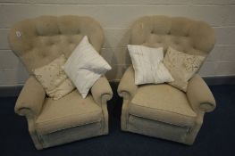 A NEAR PAIR PLUMBS CREAM UPHOLSTERED BUTTON BACK ARMCHAIRS, one chair with a sprung back to base,