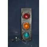 A DECORATIVE TRAFFIC LIGHT HANGING LIGHT with three switches (no bulbs so untestable)