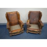 A PAIR OF DISTRESSED EARLY 20TH CENTURY BROWN LEATHER WINGBACK CLUB CHAIRS, on front bun feet, width